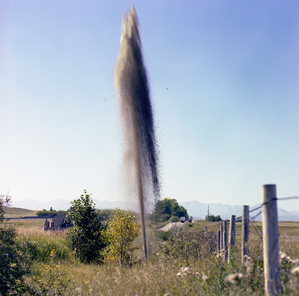 Seismic Charge Exploding and Sending a Plume of Mud Flying High into the Air